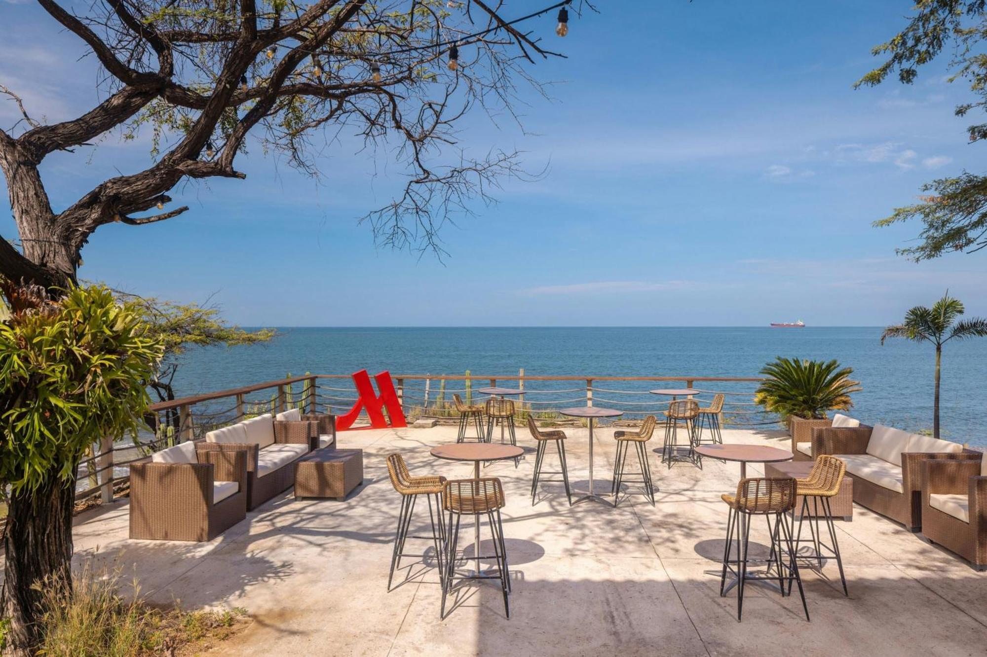 Santa Marta Marriott Resort Playa Dormida Exterior foto Beachfront lounge at W Retreats & Spa, Maldives
